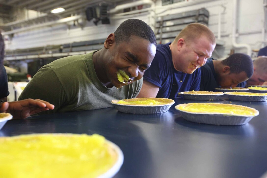 Lance Cpl. Courtney Patterson, an avionics supply specialist from Chicago with Marine Avionics Logistics Squadron 14, Marine Medium Tiltrotor Squadron 261 (Reinforced), 24th Marine Expeditionary Unit, took part in a pie eating contest in celebration of the 4th of July, aboard the USS Iwo Jima. The 24th MEU is deployed with the Iwo Jima Amphibious Ready Group as a theater reserve force for U.S. Central Command. The group is providing support for maritime security operations and theater security cooperation efforts in the U.S. Navy's 5th Fleet area of responsibility.