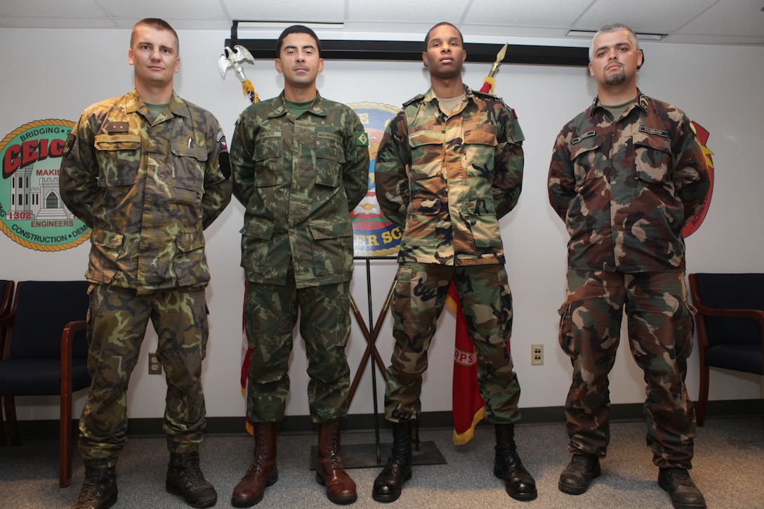 2nd Lt. Daniel Moravec, Army of the Czech Republic, 1st Lt. Vinicius Oliveira Brazilian Navy, 1st Lt. Cortess Whilby,  Jamaican Defense Force,  and Staff Sgt. Tamas Batary Hungarian Army, are enrolled as international students at the Marine Corps Engineer School aboard Marine Corps Base Camp Lejeune for 2012. The longest course offered by MCES is four months, and international students have the ability to attend most of the schools courses. They undergo the same training as the Marines who attend MCES and will return to their respective militaries to help put their unique experiences training with the Marine Corps to work for their home nations. 