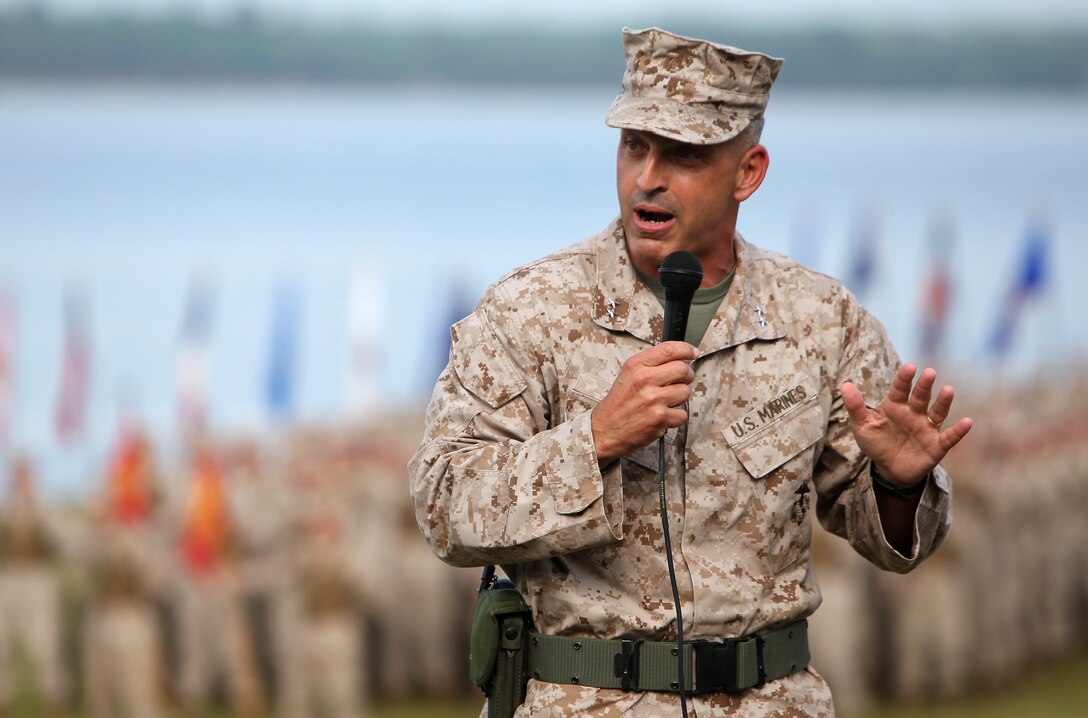Maj. Gen. Michael G. Dana, of Schenectady, N.Y., addresses a crowd of colleagues, friends and mentors during the 2nd Marine Logistics Group change of command ceremony aboard Camp Lejeune, N.C., July 12, 2012. Dana relinquished command to Col. Mark R. Hollahan, the commanding officer of 2nd MLG’s Combat Logistics Regiment 27. Dana will now report for duty as the assistant deputy commandant for Installations and Logistics, Headquarters Marine Corps, Washington. (U.S. Marine Corps photo by Staff Sgt. Justin J. Shemanski)