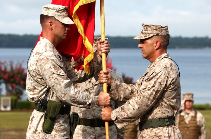 Maj. Gen. Michael G. Dana, commanding general of 2d Marine Logistics Group, relinquishes his command to Col. Mark R. Hollahan on Camp Lejeune NC, July 12, 2012. (U.S. Marine Corps photo by Sgt. Anthony L. Ortiz / Released)