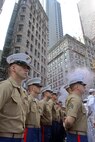 Marines and sailors stand at parade rest during a 4th of July celebration as part of Boston Navy Week 2012. This celebration is one of 15 signature events planned across America in 2012. The eight-day long event commemorates the Bicentennial of the War of 1812, hosting service members from the U.S. Navy, Marine Corps and Coast Guard and coalition ships from around the world. 