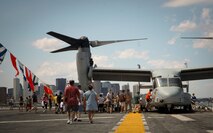 Boston spectators tour an MV-22B Osprey from Marine Medium Tiltrotor Squadron 162, stationed aboard Marine Corps Air Station New River, while VMM-162 Marines explain the Osprey's capabilities aboard the USS Wasp, June 29. The USS Wasp was in Boston to raise awareness of the Navy and Marine Corps’ role in the current and future security environment.