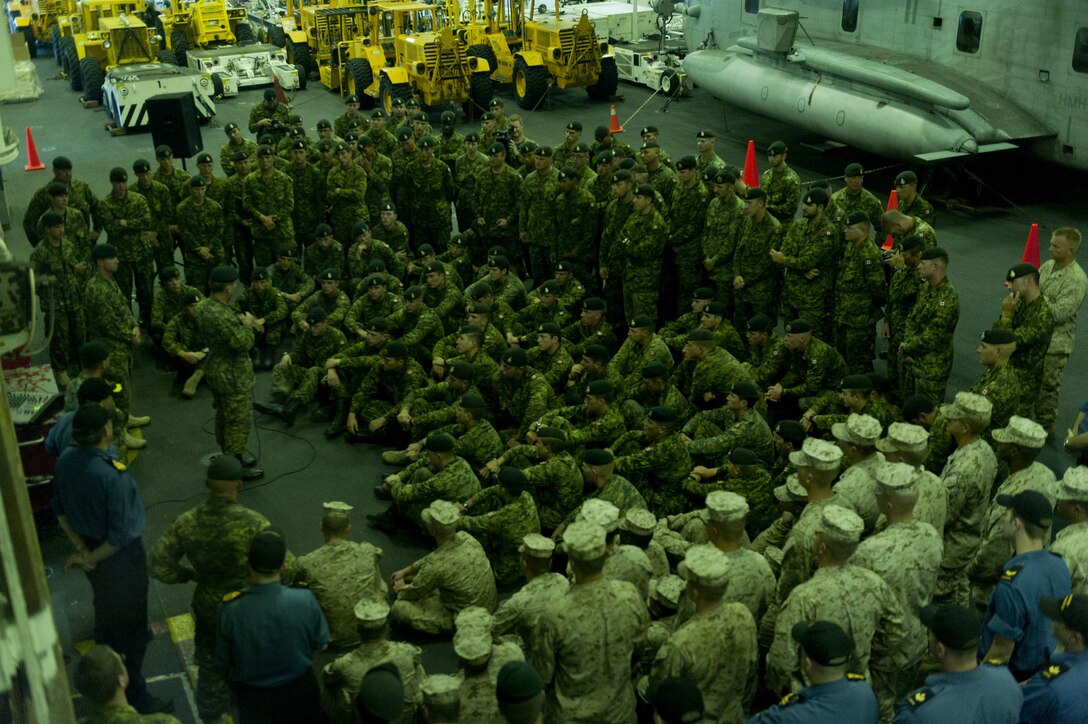 The commander of Canadian Expeditionary Force Command Headquarters, Lt. Gen. Stuart Beare, speaks with soldiers of 2nd Battalion, Princess Patricia’s Canadian Light Infantry (2PPCLI) from Shilo, Manitoba during a commander’s call in the hangar bay aboard the amphibious assault ship USS Essex (LHD 2). Twenty-two nations, more than 40 ships and submarines, more than 200 aircraft and 25,000 personnel are participating in RIMPAC exercise from June 29 to Aug. 3, in and around the Hawaiian Islands. The world's largest international maritime exercise, RIMPAC provides a unique training opportunity that helps participants foster and sustain the cooperative relationships that are critical to ensuring the safety of sea lanes and security on the world's oceans. RIMPAC 2012 is the 23rd exercise in the series that began in 1971.