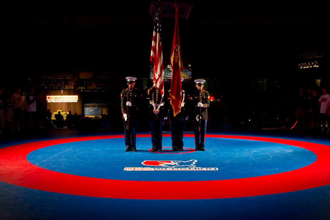 Marines with Recruiting Substation Burnsville present the colors before the Cadet Greco-Roman National championship matches at the Fargodome July 16. The 2012 Junior and Cadet Nationals kicked off on Saturday with the Cadet women's freestyle competition. The event will conclude on July 21 with the Junior Men's Freestyle championship.