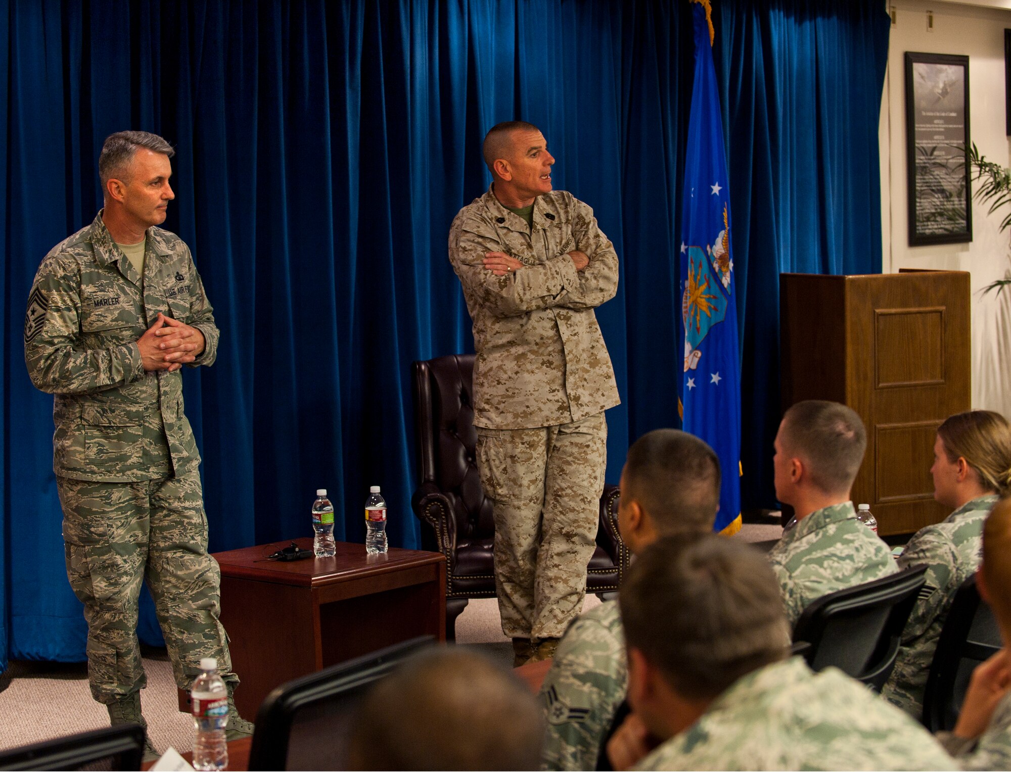 U.S. Marine Corps Sgt. Maj. Bryan Battaglia, Senior Enlisted Advisor to the Joint Chiefs of Staff and Chief Master Sgt. Vincent Marler, 99 Air Base Wing command chief, speak to Airman Leadership School students about his greatest inspirations July 10, 2012, at Nellis Air Force Base, Nev. Battaglia served as the senior enlisted advisor at U.S. Joint Forces Command with the current Army Chief of Staff General Raymond Odierno
(U.S. Air Force photo by Airman 1st Class Jason Couillard)