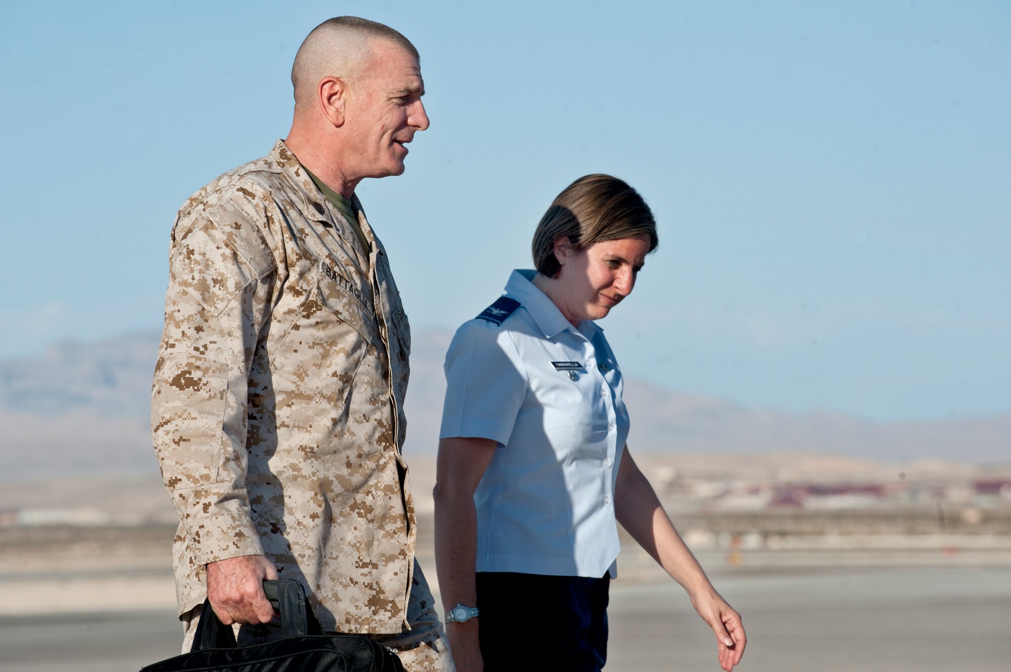 U.S. Marine Corps Sgt. Maj. Bryan Battaglia, Senior Enlisted Advisor to the Joint Chiefs of Staff, speaks with Col. Carol Yanarella, 99th Air Base Wing vice commander, July 9, 2012, at Nellis Air Force Base, Nev. Battaglia spoke to Airmen about his military experiences throughout his career and answered questions during an enlisted assembly.
(U.S. Air Force photo by Airman 1st Class Jason Couillard)