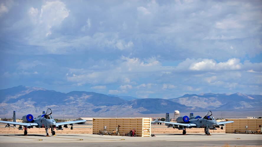 A-10C Thunderbolt II from Moody Air Force Base, Ga., participate in Red Flag 12-4 at Nellis AFB, Nev. Moody is the host unit for this Red Flag bring more than 200 Airmen and 14 A-10s. The purpose of Red Flag is to train pilots from the U.S., NATO and other allied countries for real combat situations. This includes the use of live ammunition for bombing exercises within the Nevada Testing and Training Range. (U.S. Air Force photo by Staff Sgt. Stephanie Mancha/Released)