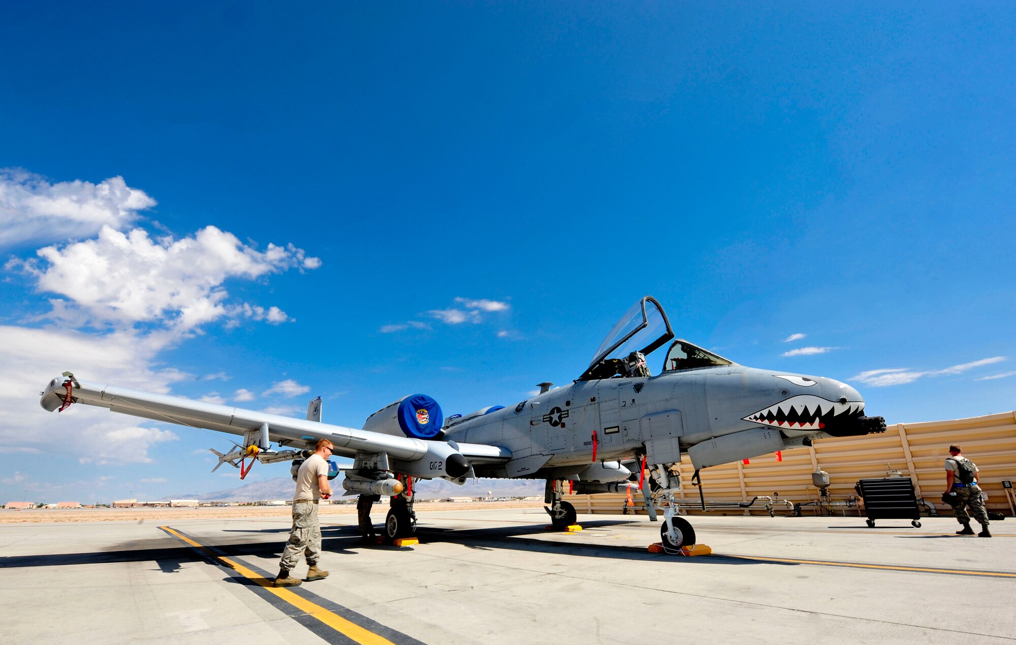 U.S. Air Force Airmen from the 23d Aircraft Maintenance Squadron, 74th Aircraft maintenance unit load perform a post load inspection on an A-10C Thunderbolt II during the Red Flag Exercise 12-4 at Nellis Air Force Base, Nev., July 16, 2012. Red Flag is a realistic aerial combat training exercise that test the limits of man and machine as they conduct training on air interdiction, combat search and rescue, dynamic and high value targeting (U.S. Air Force photo by Staff Sgt. Stephanie Mancha/Released)