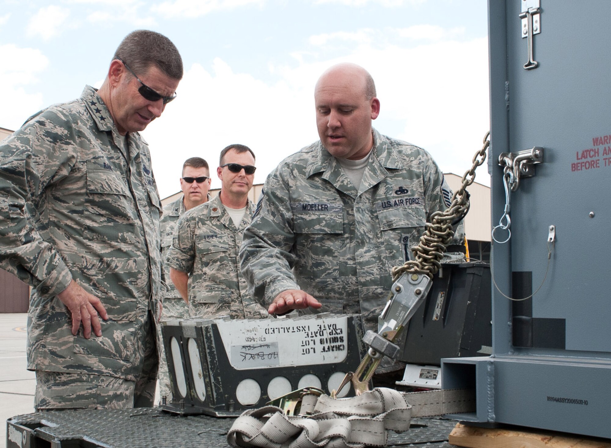 Master Sgt. Wade Moeller, 28th Munitions Squadron armament maintenance NCO in charge, explains B-1 bomber chaff and flare transport modules to Lt. Gen. Robin Rand, 12th Air Force commander, on the flightline during the general’s visit at Ellsworth Air Force Base, S.D., July 12, 2012. Rand toured all the bases under the 12th AF command to discuss mission priorities and gain insight to operational successes and shortfalls. (U.S. Air Force photo by Airman 1st Class Alystria Maurer) 