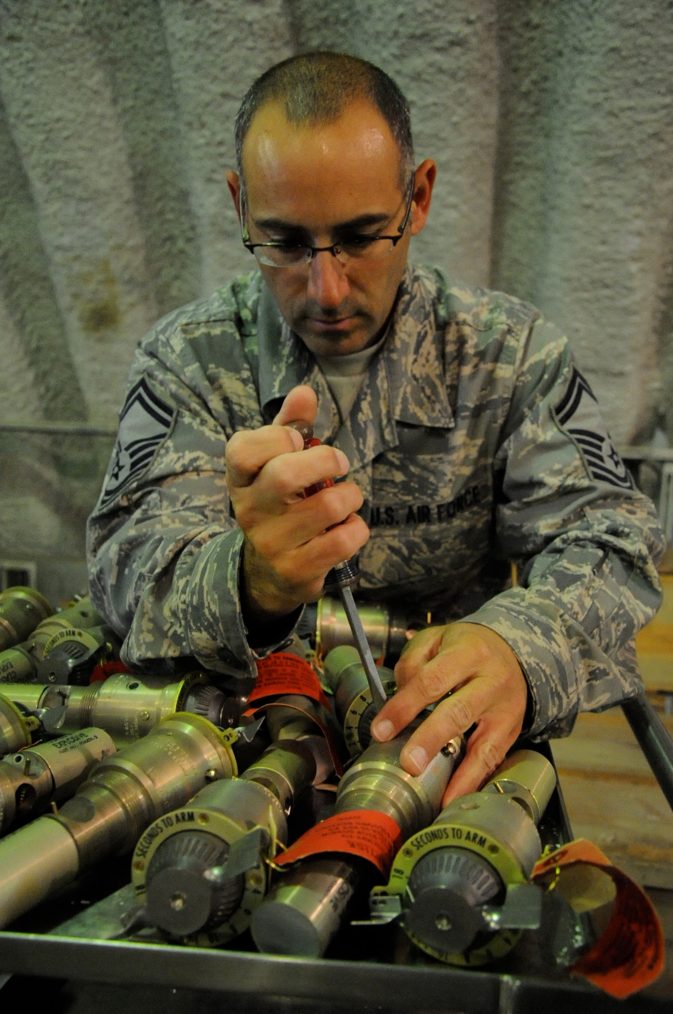 EIELSON AIR FORCE BASE, Alaska -- Master Sgt. David Paladino, munitions technician, builds bombs, July 16, 2012, to be used during a live-employment exercise here. Paladino, along with approximately 300 other reservists assigned to the 442nd Fighter Wing, Whiteman Air Force Base, Mo., are deployed here for training. The 442nd FW is an A-10 Thunderbolt II Air Force Reserve unit at Whiteman Air Force Base, Mo. (U.S. Air Force photo/Staff Sgt. Danielle Johnston)