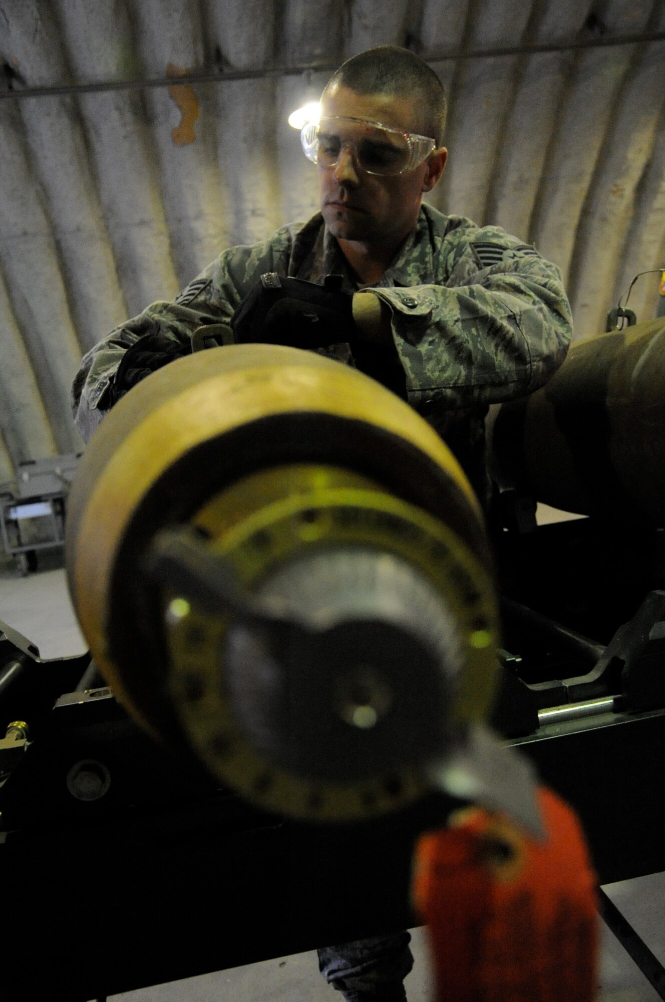 EIELSON AIR FORCE BASE, Alaska -- Staff Sgt. David Rogers, munitions technician, builds a Mark-82 for a live-employment exercise with the  A-10 Thunderbolt II aircraft assigned to the 442nd Fighter Wing and deployed here for training. The munitions technicians are assigned to the 442nd Maintenance Squadron, part of the 442nd FW, Air Force Reserve unit at Whiteman Air Force Base, Mo. (U.S. Air Force photo/Staff Sgt. Danielle Johnston)