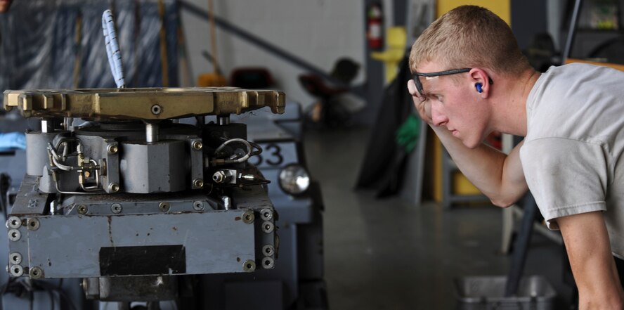 Airman 1st Class Joseph DeArment, 2nd Maintenance Squadron aerospace ground equipment journeyman, inspects a MHU-83 D/E bomb lift on Barksdale Air Force Base, La., July 16. After replacing the outrigger, DeArment tested the machine. Aerospace ground equipment Airmen maintain, inspect, test and operate AGE to ensure serviceability. (U.S. Air Force photo/Airman 1st Class Micaiah Anthony)(RELEASED)