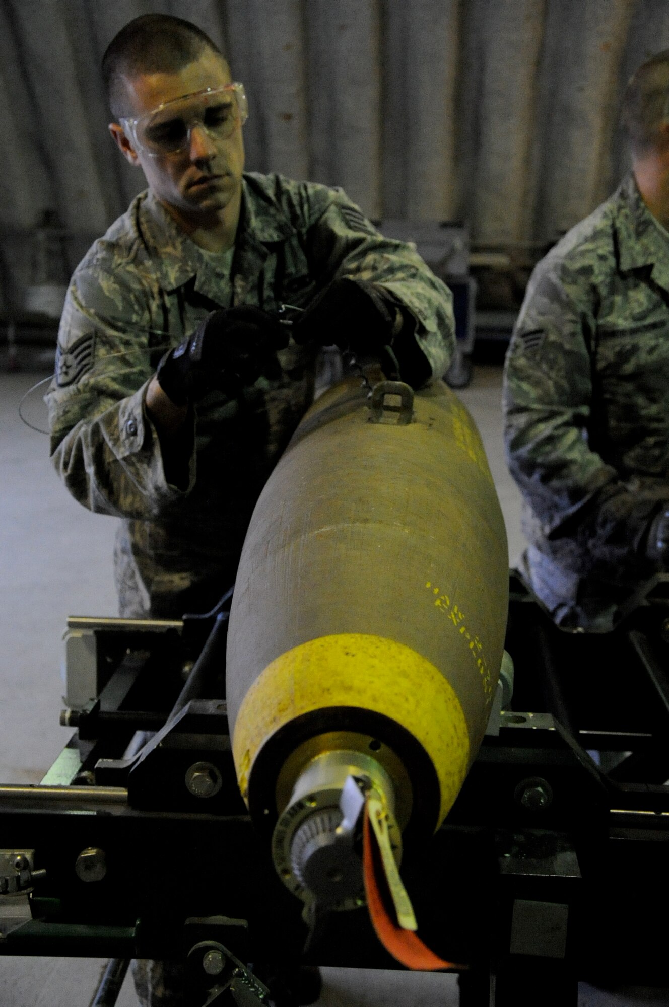 EIELSON AIR FORCE BASE, Alaska -- Staff Sgt. David Rogers, munitions technician, builds a Mark-82 for an A-10 Thunderbolt II aircraft assigned to the 442nd Fighter Wing and deployed here for training. Rogers is assigned to the 442nd Maintenance Squadron, part of the 442nd FW, Air Force Reserve unit at Whiteman Air Force Base, Mo. (U.S. Air Force photo/Staff Sgt. Danielle Johnston)
