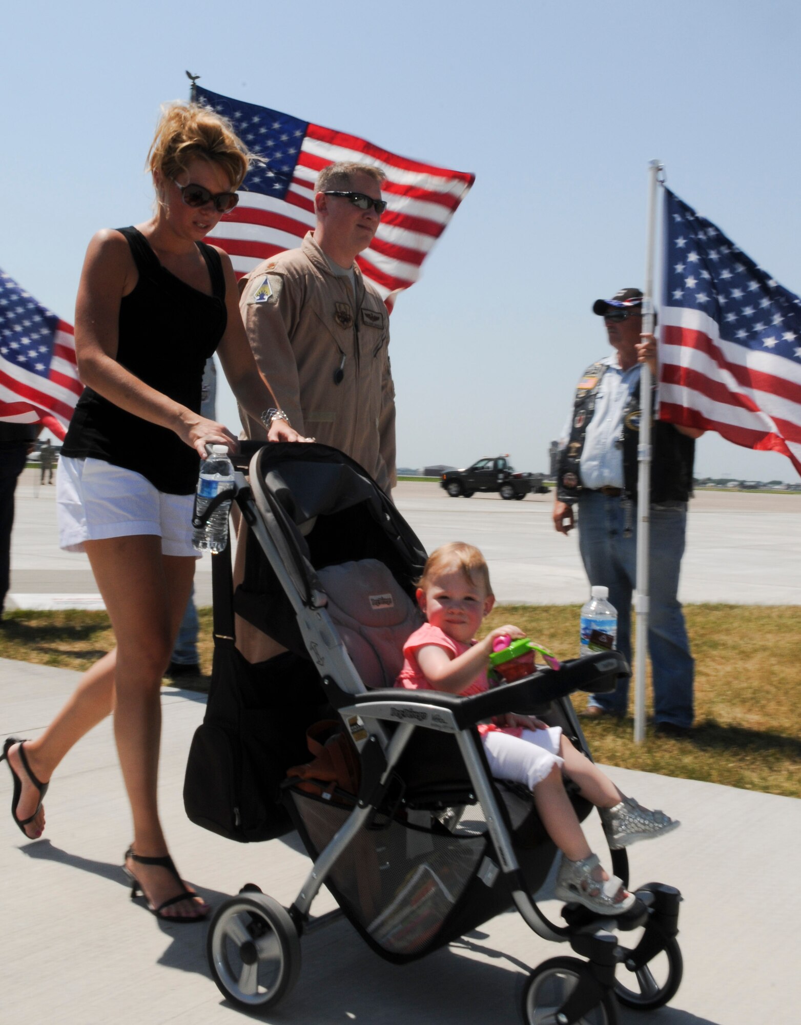 The last Minnesota Air National Guard C-130 “Hercules” from the current deployment arrived on July 16, 2012, bringing home about thirty Airmen from deployment to Southwest Asia to the St. Paul Air National Guard base, greeted by enthusiastic family and friends. Three C-130 flights, each with about thirty Airmen aboard, redeployed back to the 133rd Airlift Wing in July. USAF official photo by Tech. Sgt. Erik Gudmundson
