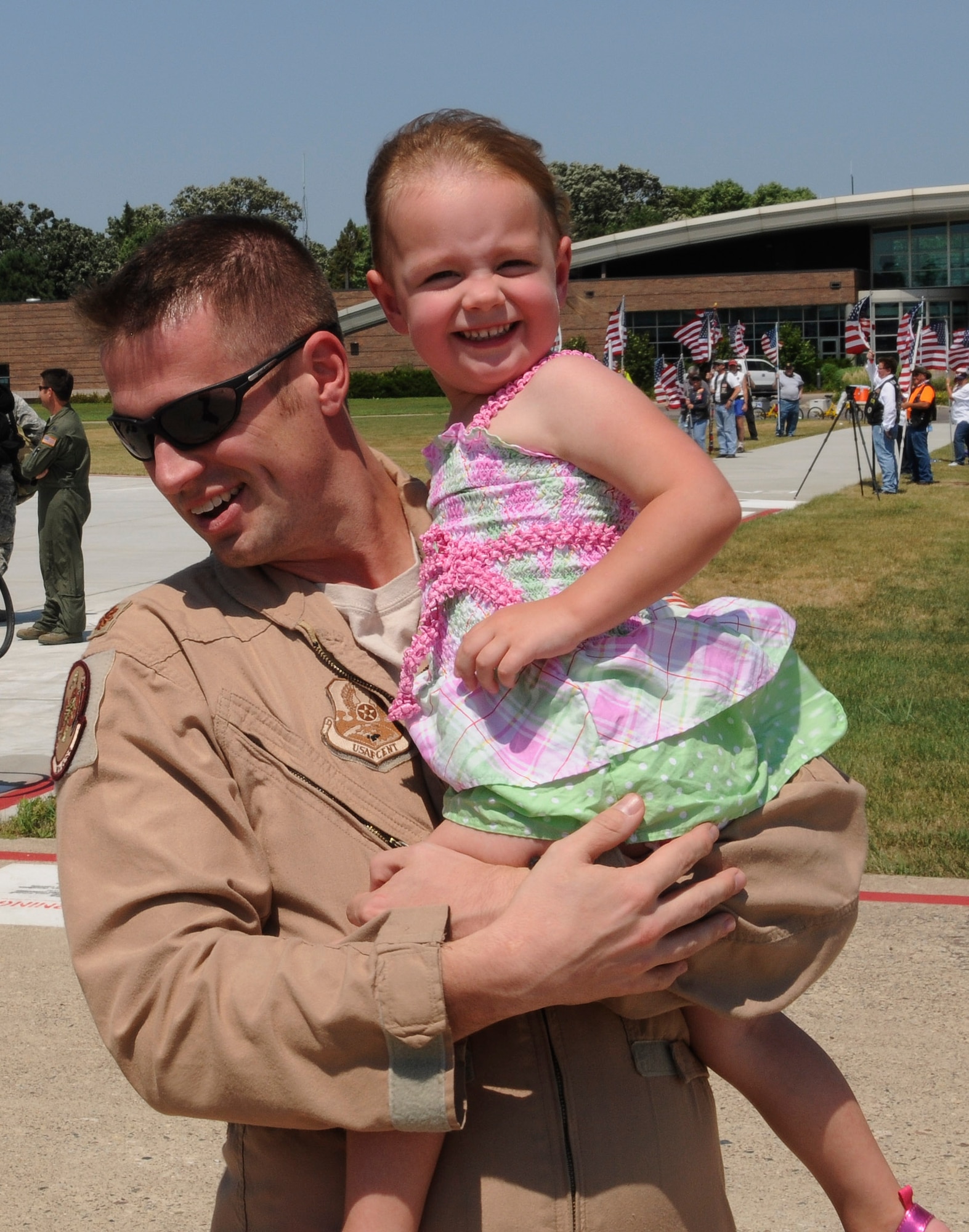 The last Minnesota Air National Guard C-130 “Hercules” from the current deployment arrived on July 16, 2012, bringing home about thirty Airmen from deployment to Southwest Asia to the St. Paul Air National Guard base, greeted by enthusiastic family and friends. Three C-130 flights, each with about thirty Airmen aboard, redeployed back to the 133rd Airlift Wing in July. USAF official photo by Tech. Sgt. Erik Gudmundson