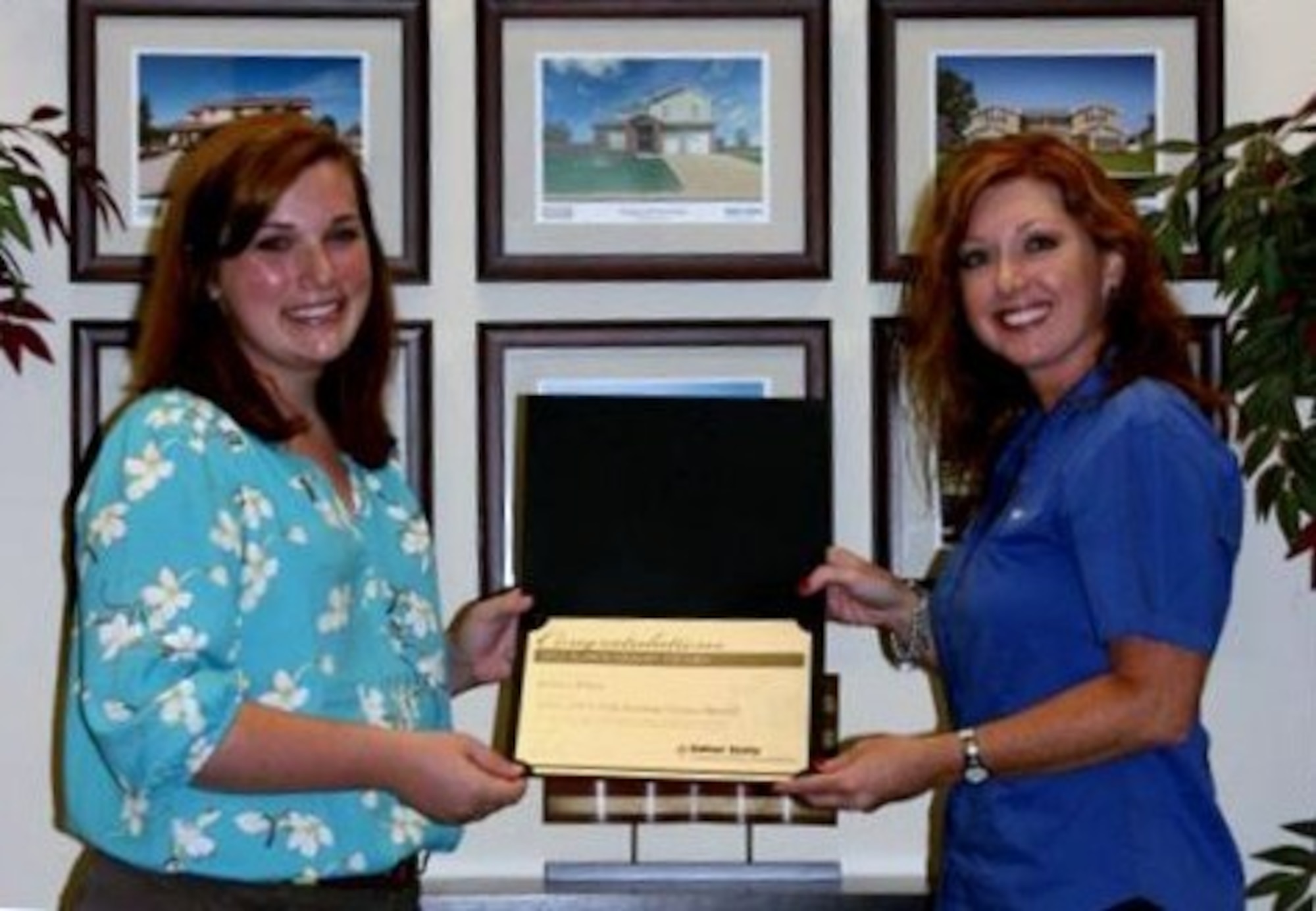 Balfour Beatty Communities recently awarded Kelsey Kline, daughter of Master Sgt. Kenneth Kline, Det. 1, 823rd RED HORSE Squadron emergency services contingency training section chief, an academic scholarship. (U.S. Air Force courtesy photo)
