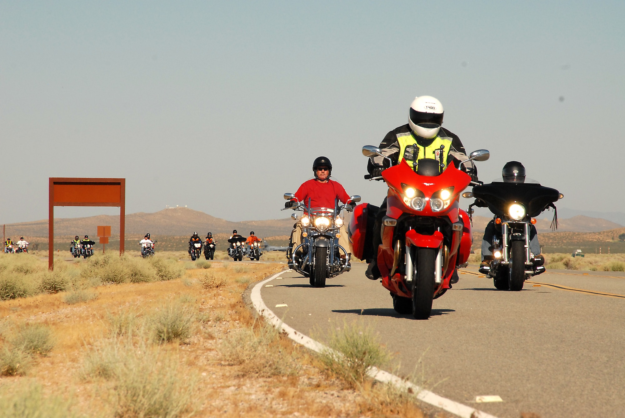 More than 60 motorcyclists ride around Edwards July 23, 2011 during the base's Motorcycle Safety Day.  (U.S. Air Force photo by Kenji Thuloweit)