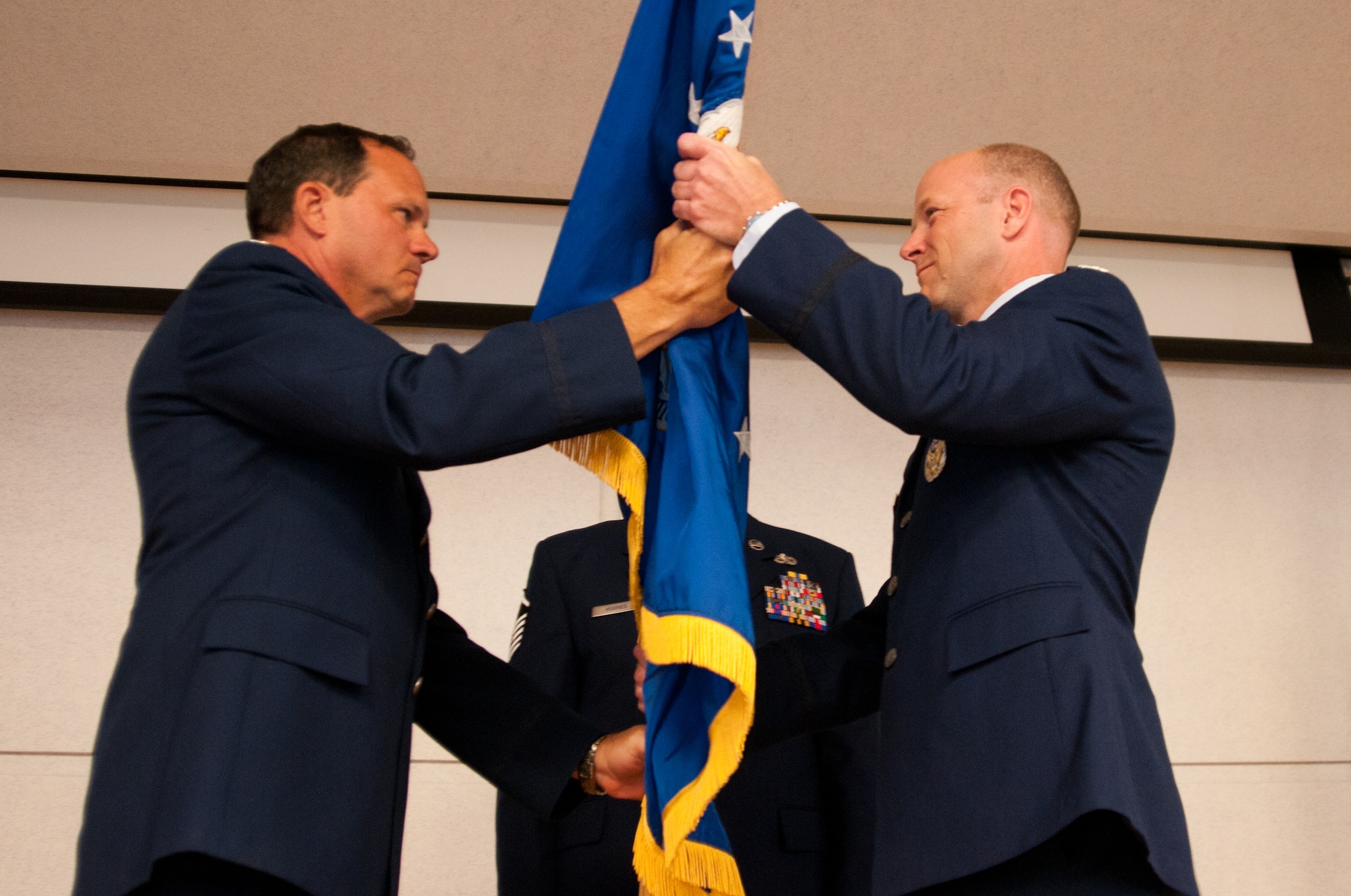 Edward Black, commander, Advanced Airlift Tactics Training Center (AATTC), Missouri Air National Guard, was promoted to colonel at Rosecrans Air National Guard Base, St. Joseph, Mo., July 13, 2012 and took control as the AATTC’s 11th commander. (Air National Guard photo, Senior Airman Kelsey Stuart/Released)