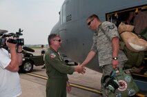 A Minnesota Air National Guard C-130 “Hercules” brings home about thirty Airmen from deployment to Southwest Asia on July 15, 2012 to the St. Paul Air Guard base, greeted by enthusiastic family and friends. One more C-130 is scheduled to arrive, with about another thirty Airmen aboard, redeploying back to the 133rd Airlift Wing. USAF official photo by Tech. Sgt. Erik Gudmundson