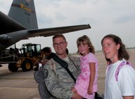 A Minnesota Air National Guard C-130 “Hercules” brings home about thirty Airmen from deployment to Southwest Asia on July 15, 2012 to the St. Paul Air Guard base, greeted by enthusiastic family and friends. One more C-130 is scheduled to arrive, with about another thirty Airmen aboard, redeploying back to the 133rd Airlift Wing. USAF official photo by Tech. Sgt. Erik Gudmundson
