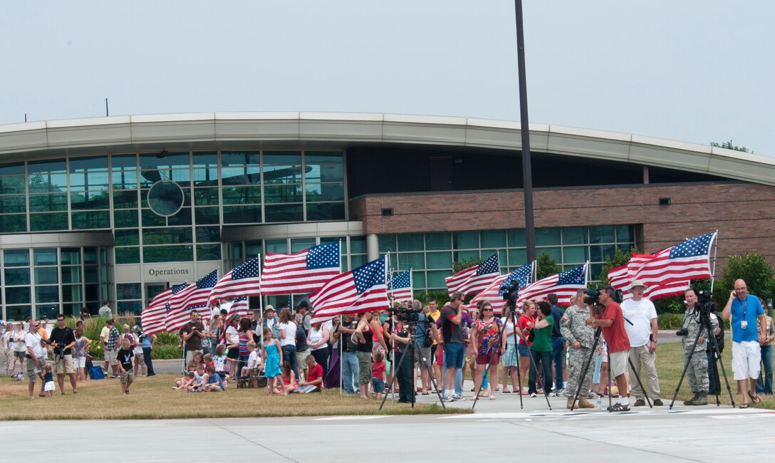 A Minnesota Air National Guard C-130 “Hercules” brings home about thirty Airmen from deployment to Southwest Asia on July 15, 2012 to the St. Paul Air Guard base, greeted by enthusiastic family and friends. One more C-130 is scheduled to arrive, with about another thirty Airmen aboard, redeploying back to the 133rd Airlift Wing. USAF official photo by Tech. Sgt. Erik Gudmundson