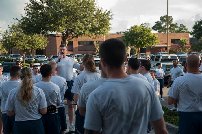 Col. Al Miller, 437th Airlift Wing vice commander, speaks to Airmen during the Commander's Challenge Run at Joint Base Charleston - Air Base July 13, 2012. The Commander's Challenge is held monthly to test Team Charleston's fitness abilities. (U.S. Air Force photo/Airman 1st Class Ashlee Galloway)