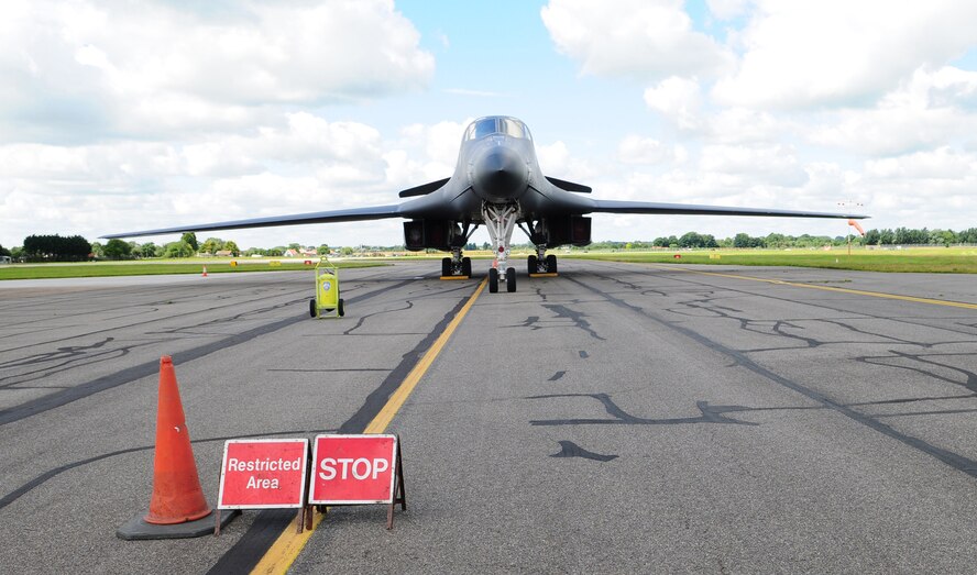 RAF MILDENHALL, England – A B-1B Lancer, here from the 7th Bomb Wing, Dyess Air Force Base, Texas, sits on the airfield at RAF Mildenhall July 12, 2012. The B-1B is the backbone of America’s long-range bomber force. The aircraft’s blended wing and body configuration, variable-geometry wings and turbofan afterburning engines combine to provide long range, maneuverability and high speed, while enhancing survivability. (U.S. Air Force photo/Karen Abeyasekere)
