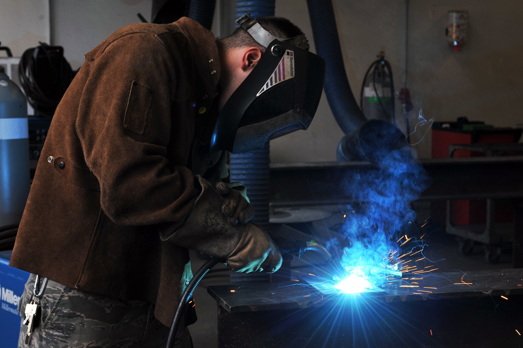 Airman 1st Class Ronald Murray, 786th Civil Engineer Squadron, structural journeyman welds sheet metal during the monthly Prime Base Engineer Emergency Force training day, Ramstein Air Base, Germany, July 12, 2012. The 86th CEG provide, maintain and protect property assigned to the 86th Airlift Wing, the Kaiserslautern Military Community and associated units while supporting worldwide contingencies with trained combat engineers and equipment. (U.S. Air Force photo/Senior Airman Caitlin O'Neil-McKeown)