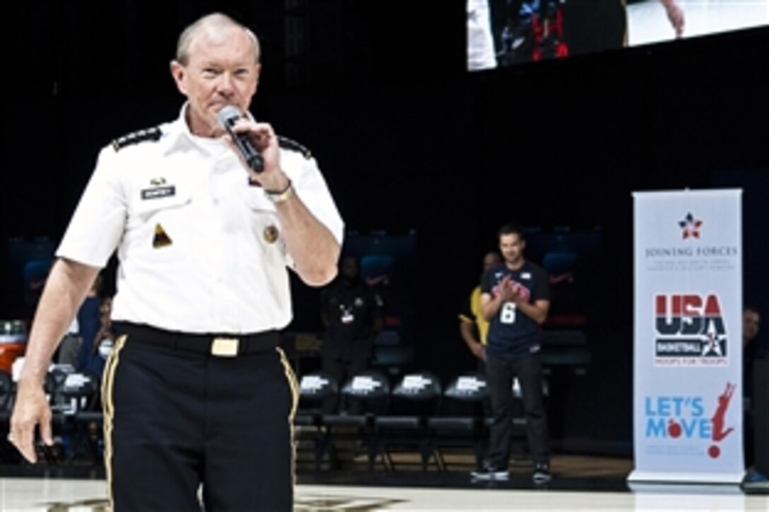 Army Gen. Martin E. Dempsey, chairman of the Joint Chiefs of Staff, spoke to players on the USA Basketball men’s and women’s national teams before they took to the courts for a scrimmage at the District of Columbia National Guard Armory in Washington, D.C. on July 14, 2012.