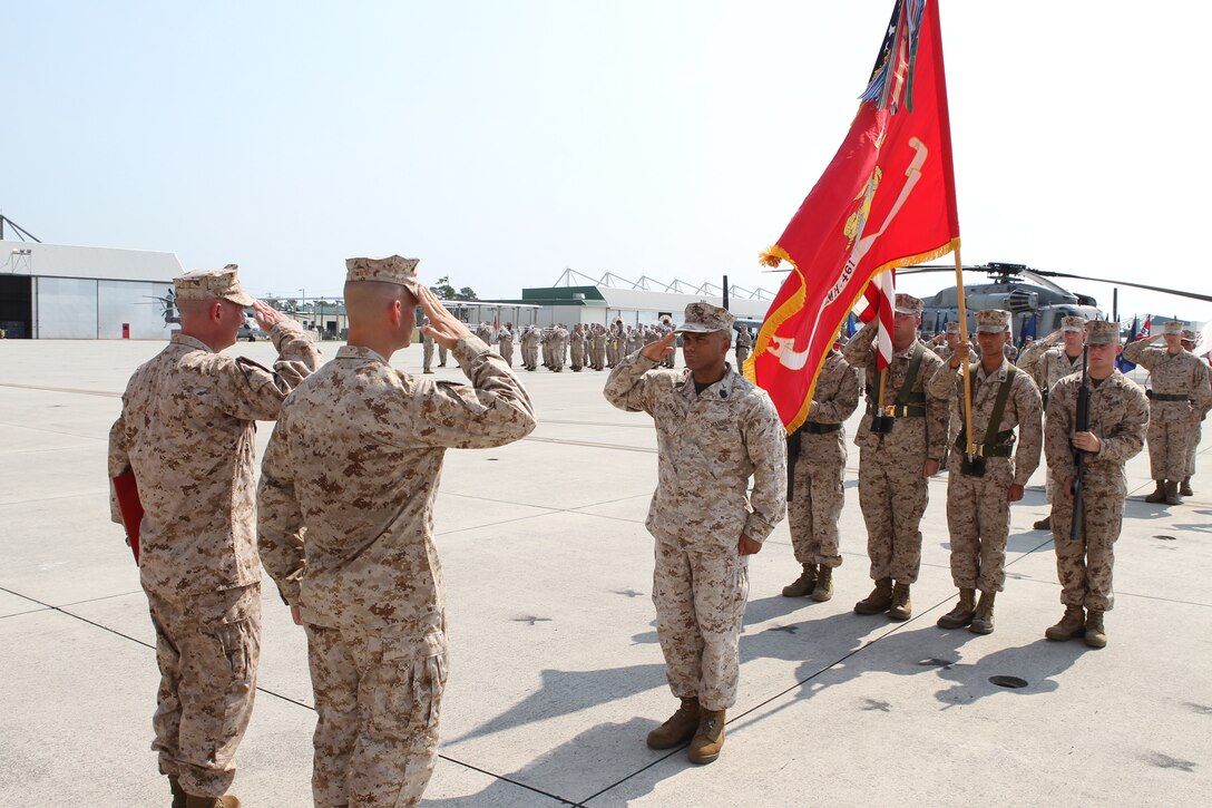 Sgt. Maj. Rodolfo R. Graham, the outgoing sergeant major of Marine Heavy Helicopter Squadron 461, salutes Lt. Col. Nicholas A. Morris, the commanding officer of HMH-461, during a relief and appointment ceremony at the squadron’s hangar, July 9. Graham passed his duties as the senior enlisted advisor for HMH-461 to Sgt. Maj. Ronald M. Jenks Jr. 