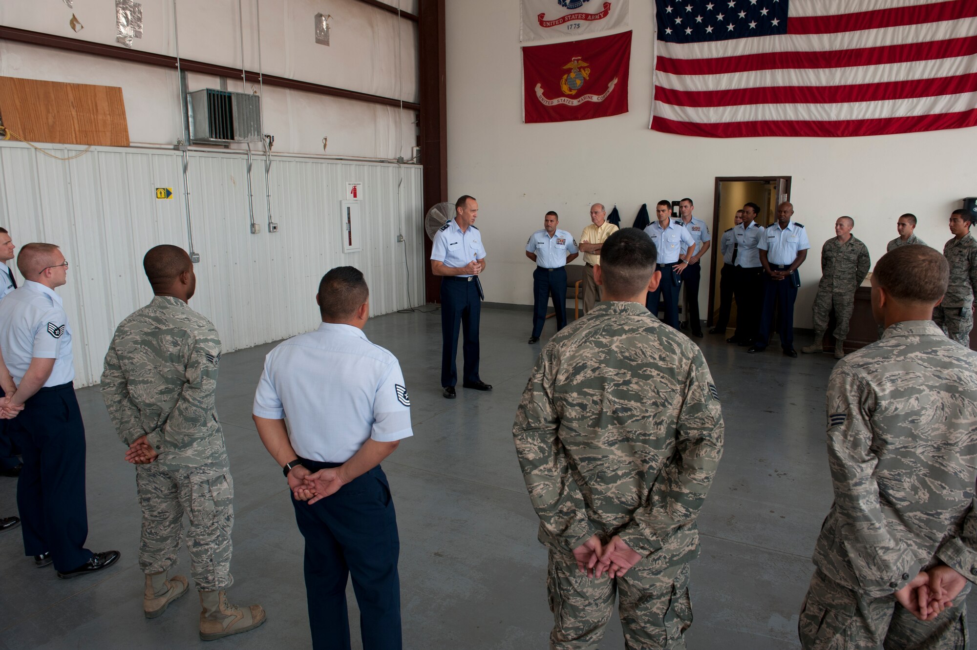 Major Gen. John Cooper speaks to Airmen from the 49th Logistics Readiness Squadron during Cooper’s visit to Holloman Air Force Base, N.M., July 16. Cooper visited the base to look at 49th LRS operations and to award the squadron with the Maj. Gen. Warren R. Carter Logistics Effectiveness Award, which named them the best logistics readiness squadron in the U.S. Air Force for 2011. Cooper is the director of logistics, deputy chief of staff for logistics, Installations and Mission Support, Headquarters U.S. Air Force, Washington, D.C. (U.S. Air Force photo by Airman Leah Ferrante/Released)