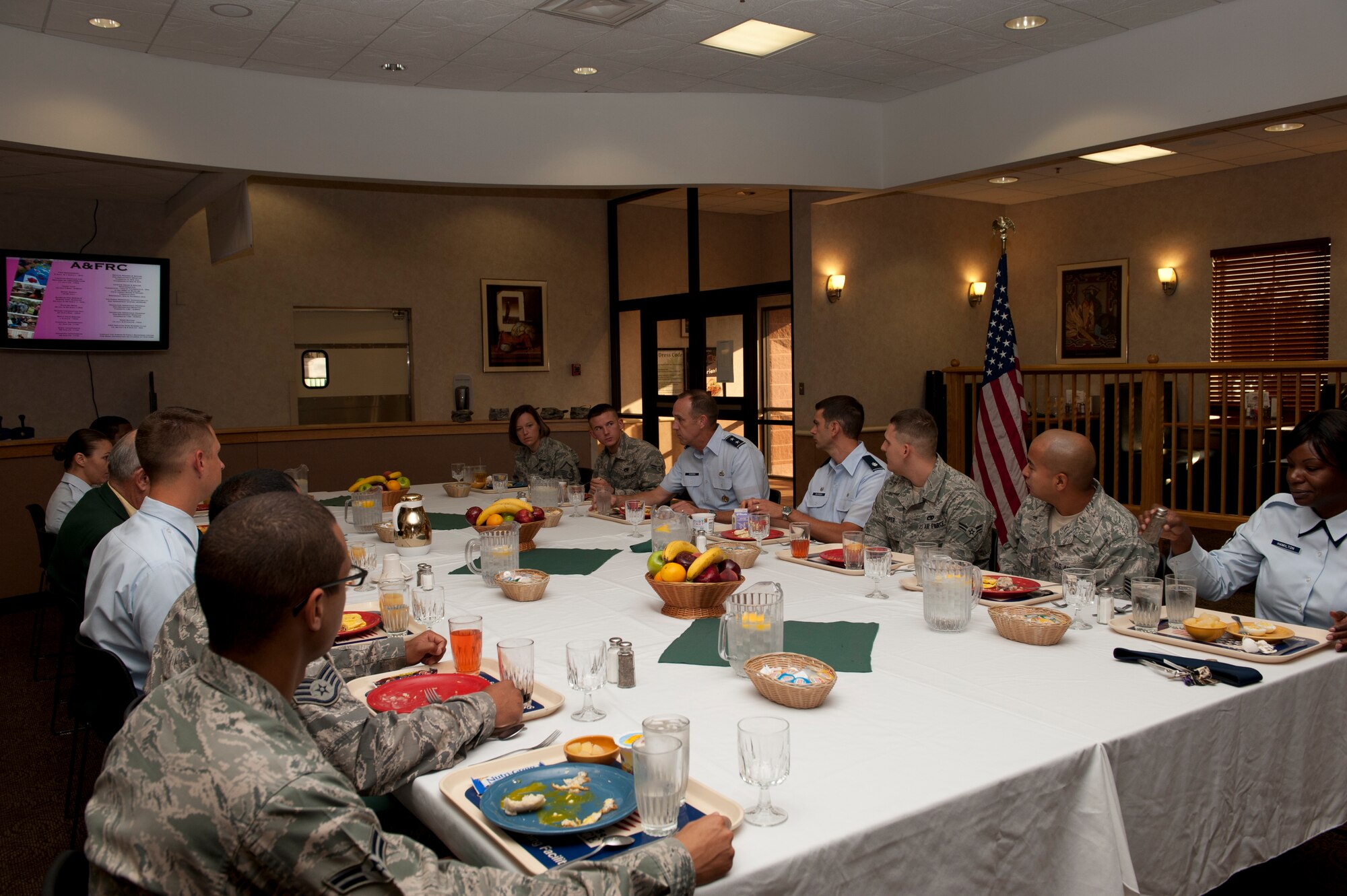 Airmen from the 49th Logistics Readiness Squadron talk to Maj. Gen. John Cooper during breakfast at Holloman Air Force Base, N.M., July 16. Cooper visited the base to look at 49th LRS operations and to award the squadron with the Maj. Gen. Warren R. Carter Logistics Effectiveness Award, which named them the best logistics readiness squadron in the U.S. Air Force for 2011. Cooper is the director of logistics, deputy chief of staff for logistics, Installations and Mission Support, Headquarters U.S. Air Force, Washington, D.C. (U.S. Air Force photo by Airman Leah Ferrante/Released)