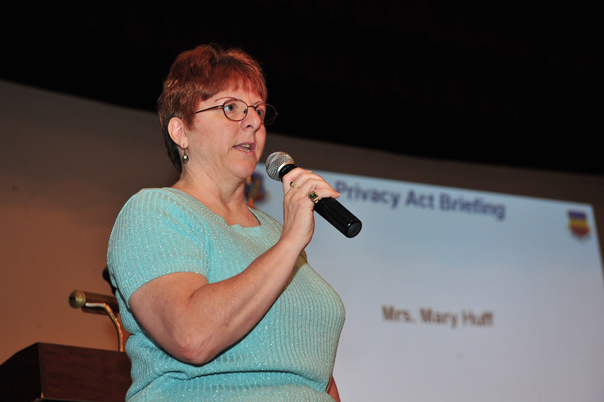 Mary Huff, base records manager, talk to 20th Fighter Wing Airmen about privacy at the enlisted call at Shaw Air Force Base, S.C., July 13, 2012. The enlisted call included a motivational video, another video from sponsors of the enlisted call and the presentation by Huff, who spoke about the Privacy Act. (U.S. Air Force photo by Krystal M. Jeffers/Released)