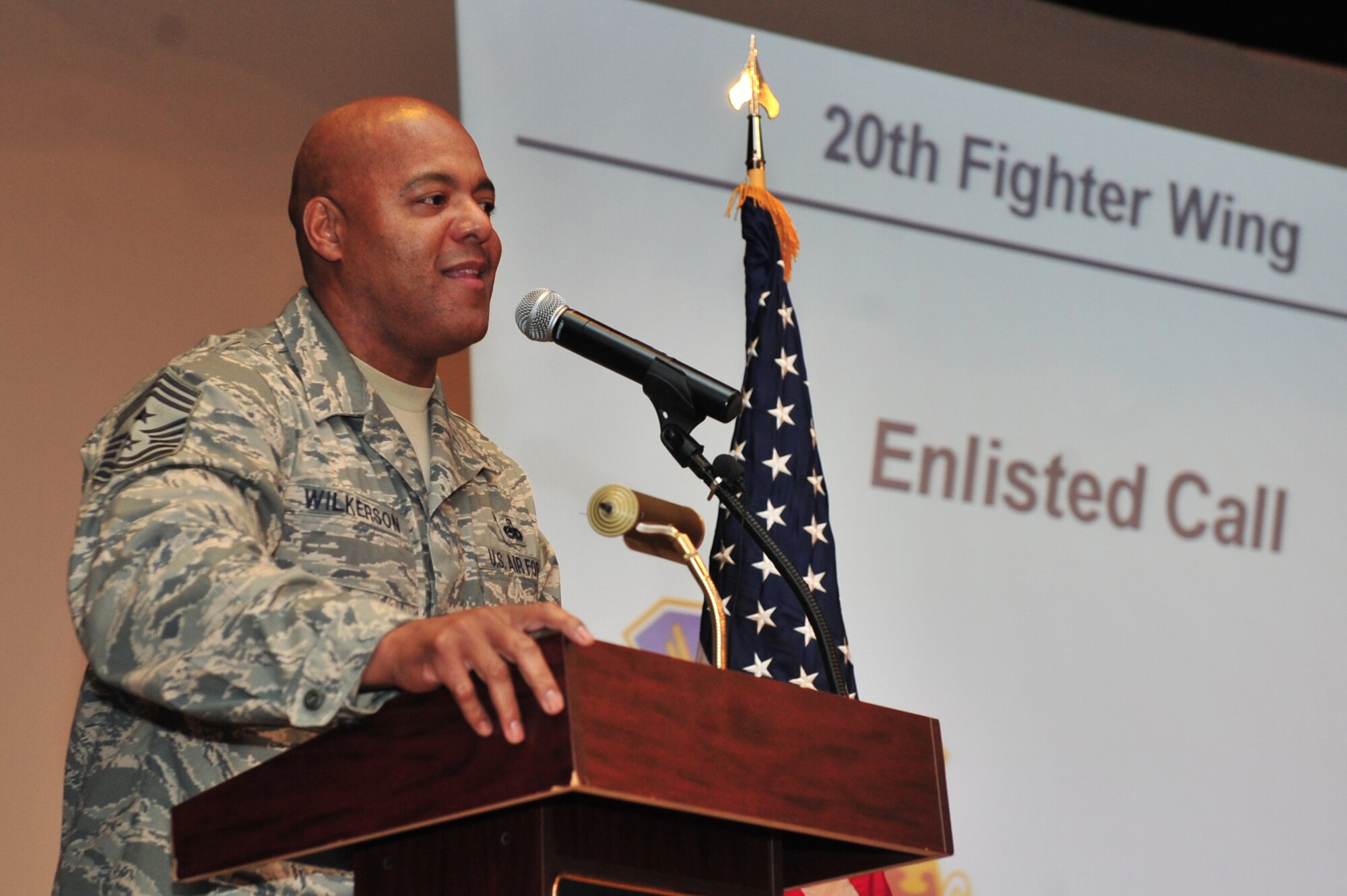 Chief Master Sgt. James Wilkerson, 20th Fighter Wing command chief, speaks to the wing?s Airmen at Shaw Air Force Base, S.C., July 13, 2012. Among his topics was the Resilient Airmen Card which he described as an ?in case of emergency? card. On the card?s back is a list of referral agencies including the chaplain, family advocacy, medical squadron, Security Forces, Airmen Against Drunk Driving and many others. (U.S. Air Force photo by Krystal M. Jeffers/Released)