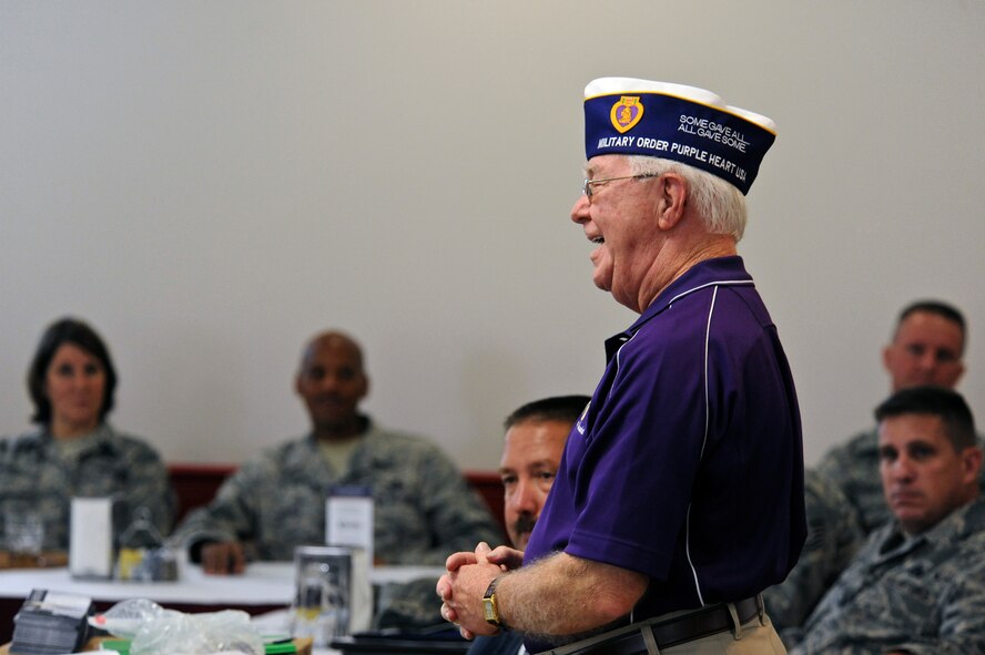 Richard Garner, Department of Louisiana Military Order of the Purple Heart commander, gives his account of what happened to his unit during the Vietnam War during an Air Force Sergeants Association membership luncheon on Barksdale Air Force Base, La., July 17. Garner and members of his unit were rescued by U.S. Air Force Pararescueman Airman 1st Class William Pitsenbarger. Pitsenbarger received the Medal of Honor for sacrificing his life in order to aid and defend the members in Garner's unit. (U.S. Air Force photo/Airman 1st Class Micaiah Anthony)(RELEASED)