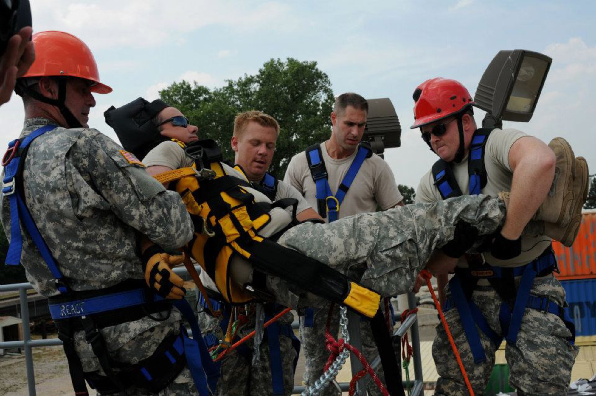 Army National Guard members, 21st Civil Support Team, New Jersey, get a simulated patient to safety while training in rescue skills with instructors from the Wisconsin Regional Emergency All-Climate Training Center during PATRIOT 12 in Volk Field, Wis., July 15, 2012. The PATRIOT 12 exercise gives 1100 guard personnel from 15 states the opportunity to integrate with local and state agencies during valuable training simulations. (National Guard photo by Airman 1st Class Penny Hamilton/Released)