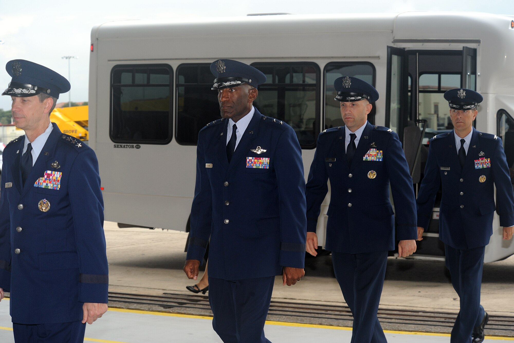 Air Force Deputy Chief of Staff for Manpower, Personnel and Services Lt. Gen. Darrell D. Jones, Air Force Personnel Center Commander Maj. Gen. A.J. Stewart, AFPC Manpower Directorate Director Col. Kent White and AFPC Services Directorate Director Col. Thomas Joyce arrive at the Air Force personnel, manpower and services inactivation and consolidation ceremony July 17 at Randolph Air Force Base. (U.S. Air Force photo/Ben Faske)