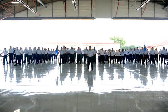 Airmen from the new Air Force Personnel Center stand in formation during the Air Force personnel, manpower and services inactivation and consolidation ceremony July 17, 2012, at Joint Base San Antonio -- Randolph. Air Force Deputy Chief of Staff for Manpower, Personnel and Services Lt. Gen. Darrell D. Jones inactivated the Air Force manpower and Air Force services agencies, designating them as AFPC directorates (U.S. Air Force photo/Ben Faske) 

