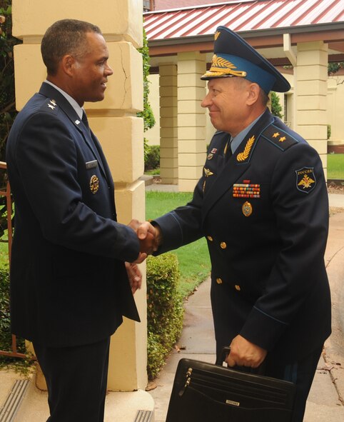 Maj. Gen. Everett Thomas, Air Force Global Strike Command vice commander, greets Gen. Lt. Anatoliy Dmitriyevick Zhikharyev, Russian Long Range Aviation and Delegation commander, outside the Eubank Conference Center on Barksdale Air Force Base, La., July 12. Zhikharyev and members of his staff visited various units on Barksdale as part of a site survey for a bomber exchange program. Ultimately, the Russian Air Force will send a bomber to Barksdale, and the 2nd Bomb wing will send a B-52H Stratofortress to Russia, enabling the two nations to share information about their operational capabilities. (U.S. Air Force photo/Senior Airman Sean Martin)(RELEASED)