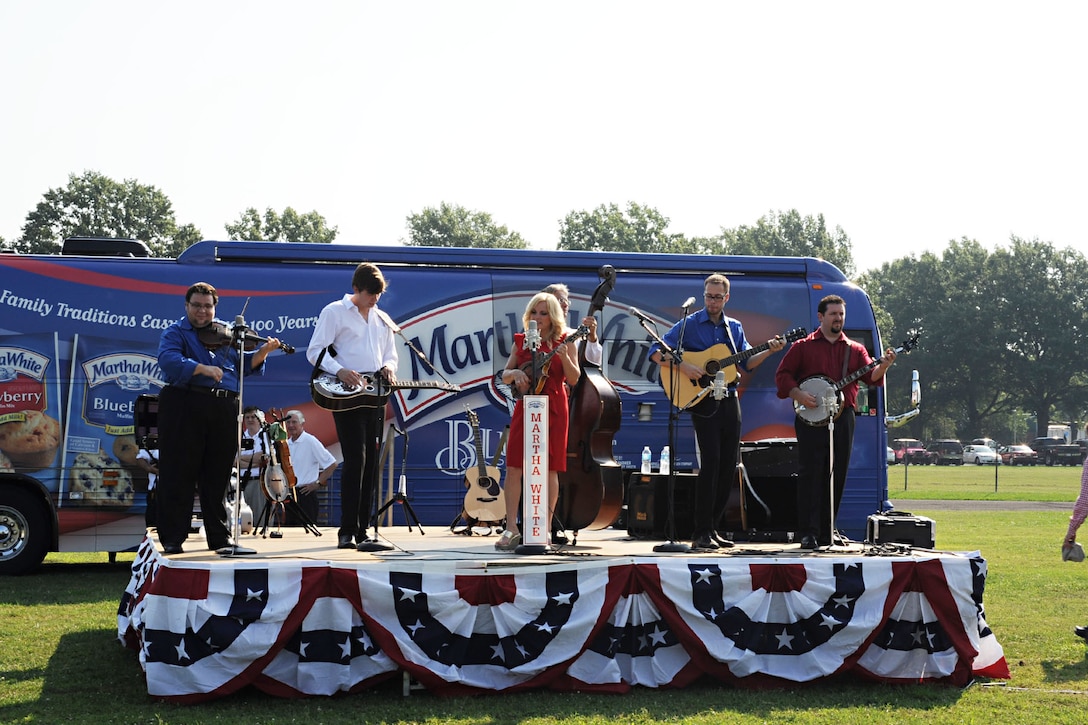 Bluegrass band, “Rhonda Vincent and The Rage”, performs during a Mission Breakfast event at Fort Eustis, Va., July 17, 2012. Service members, retirees and dependents enjoyed live music and free food provided by the Smucker’s company. (U.S. Air Force photo by Staff Sgt. Ashley Hawkins/Released)