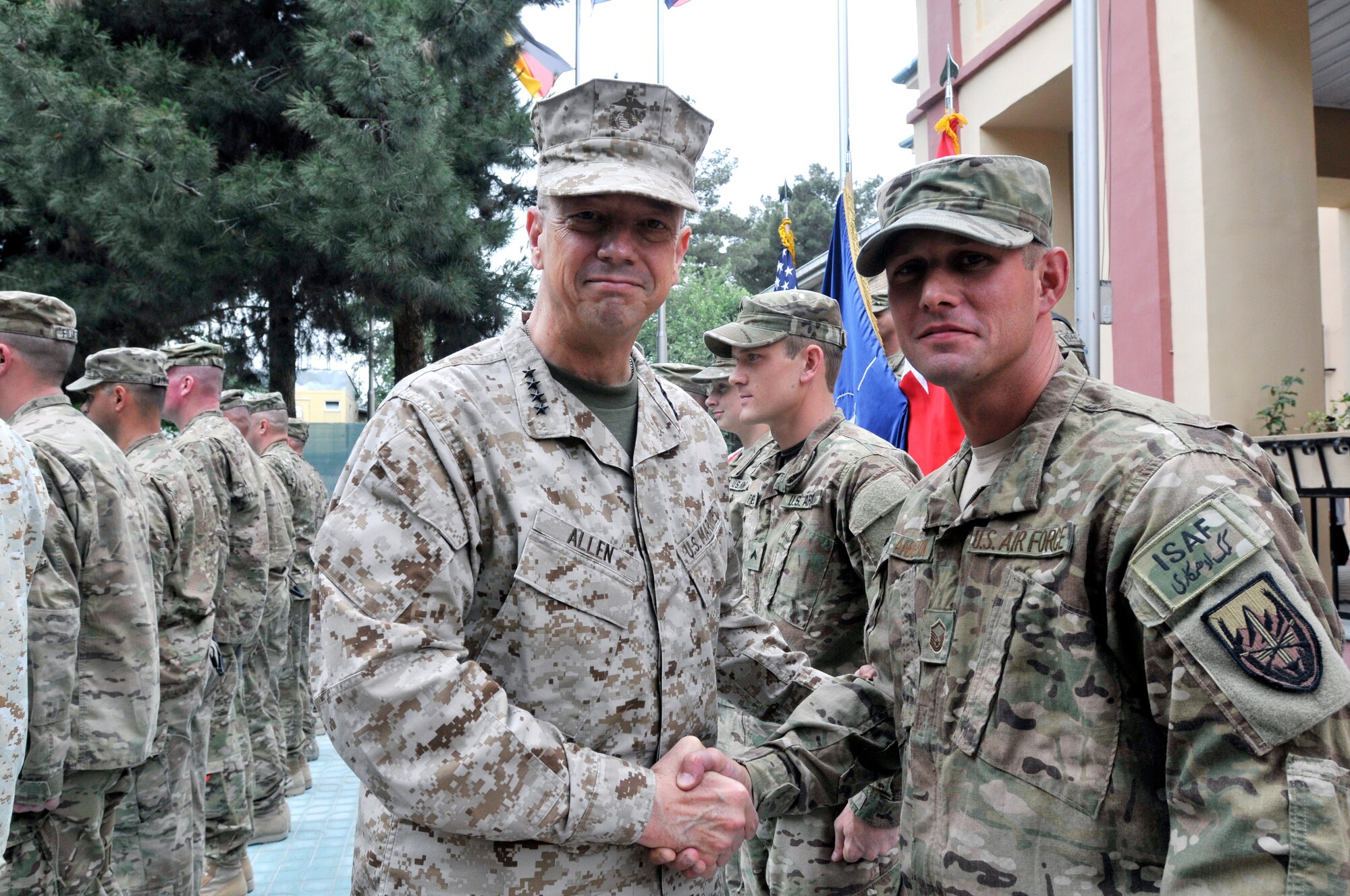 Master Sgt. Chadrick Anderson received a 4-star coin from Gen. John R. Allen, COMISAF, for his support during President Obama's visit to Afghanistan.  Anderson is a Reservist deployed to Afghanistan from the 477th Civil Engineer Squadron, Joint Base Elmendorf-Richardson, Alaska. (Courtesy Photo)) 