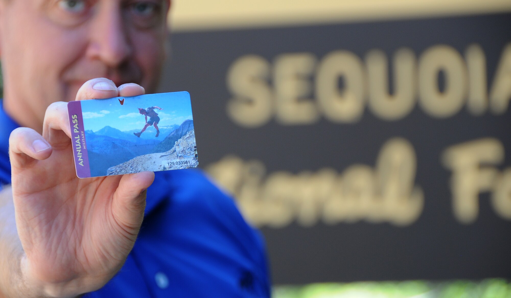 Master Sgt Vincent De Groot, of the Iowa Air National Guard, displays an Annual Pass to the National Parks he picked up during a recent visit to Sequoia National Park in California. The Annual Pass is available for free to all members of the military and covers admission fees to all National Parks.