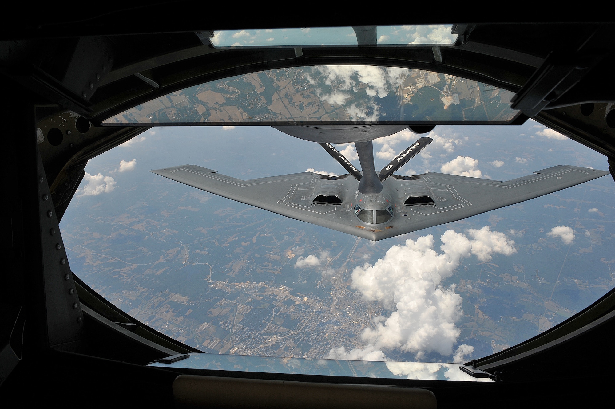 A KC-135 Stratotanker from the 22nd Air Refueling Wing refuels a B-2 Spirit from the 509th Bomb Wing, July 12, 2012. The 509th BW can launch combat sorties directly from Missouri to any spot on the globe, engaging adversaries with large payloads of traditional or precision-guided munitions. (U.S. Air Force photo/Airman 1st Class Maurice A. Hodges)