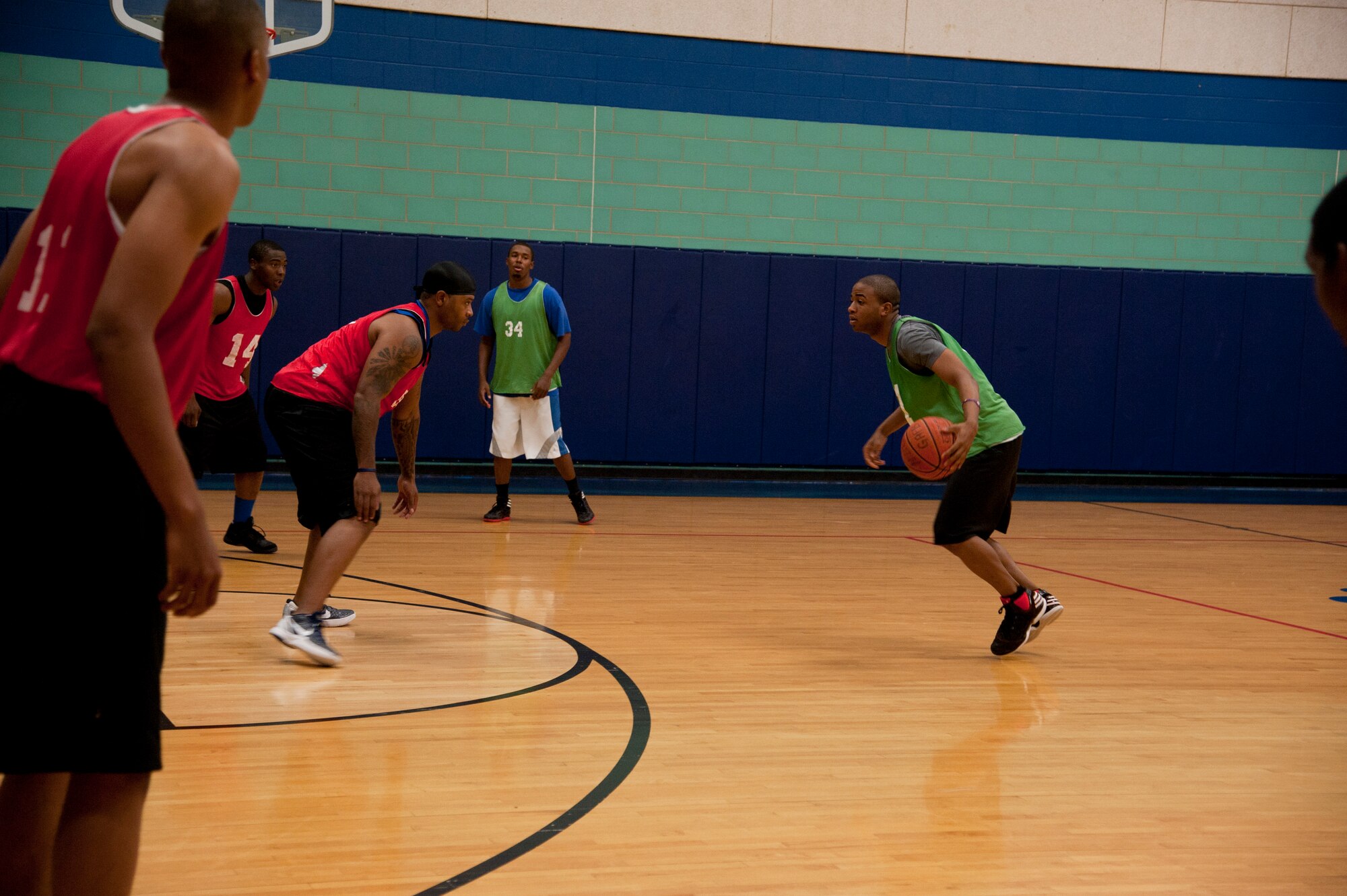 GOODFELLOW AIR FORCE BASE, Texas - Senior Airman Corey Pasley, 17th Medical Operations Squadron ‘Team 1’ member, competes in the "Bring the Rock" basketball tournament at the Mathis Fitness Center July 14. The 5-on-5 player free tournament was presented by Taylor Chapel and the 17th Force Support Squadron. (U.S. Air Force Photo/ Airman 1st Class Erica Flores) 