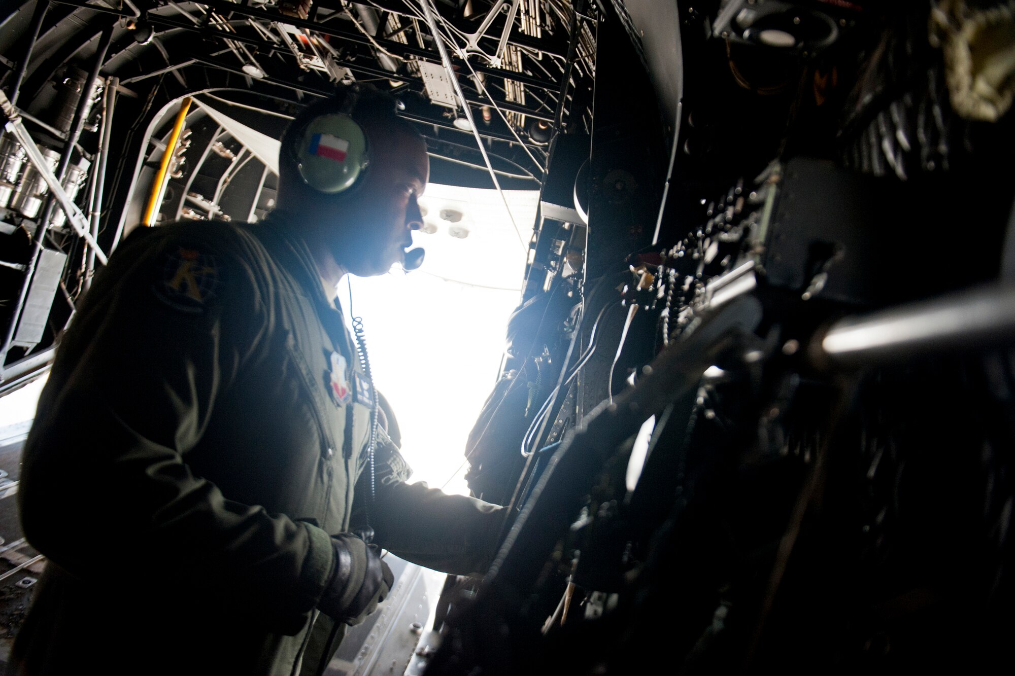 U.S. Air Force Tech. Sgt. Alfert Anderson, 71st Rescue Squadron loadmaster, prepares a HC-130P Combat King for flight July 16, 2012, at Moody Air Force Base, Ga. Part of a loadmaster’s job is to calculate the weight and balance of the cargo to ensure the aircraft flies safely. (U.S. Air Force photo by Staff Sgt. Jamal D. Sutter/Released) 