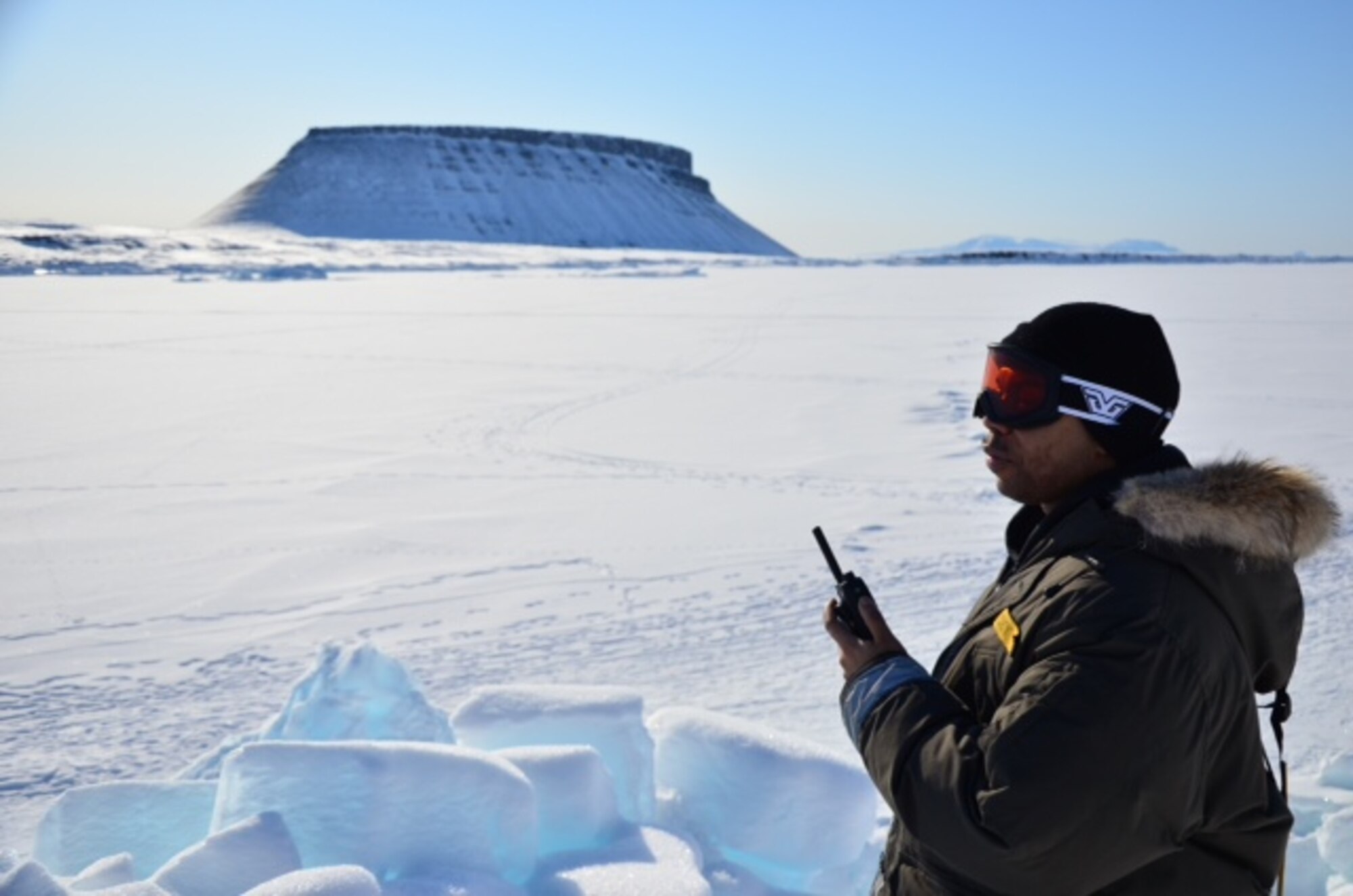 Tech. Sgt. Darrell Kinsey, 821st Support Squadron, tests Thule’s new Terrestrial Trucked Radio on North Bay near Thule, Greenland. (U.S. Air Force photo/Tech. Sgt. Dan Gomez)