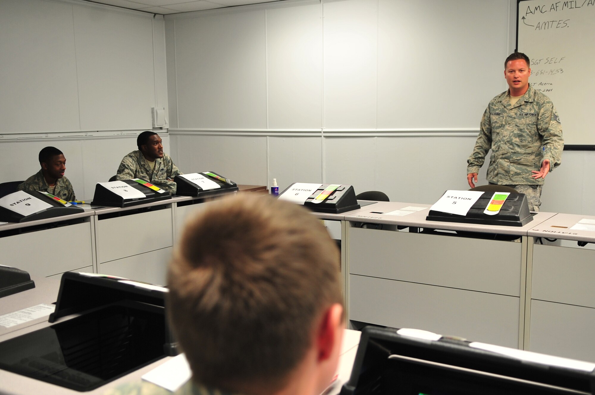U.S. Air Force Staff Sgt. Jason Watkins, 20th Maintenance Operations Squadron maintenance training flight instructor, talks to Airman at Shaw Air Force Base, S.C. July 16, 2012. Watkins is the Shaw Spotlight for the week of July 16 through 20. (U.S. Air Force photo by Airman 1st Class Ashley L. Gardner/ Released)