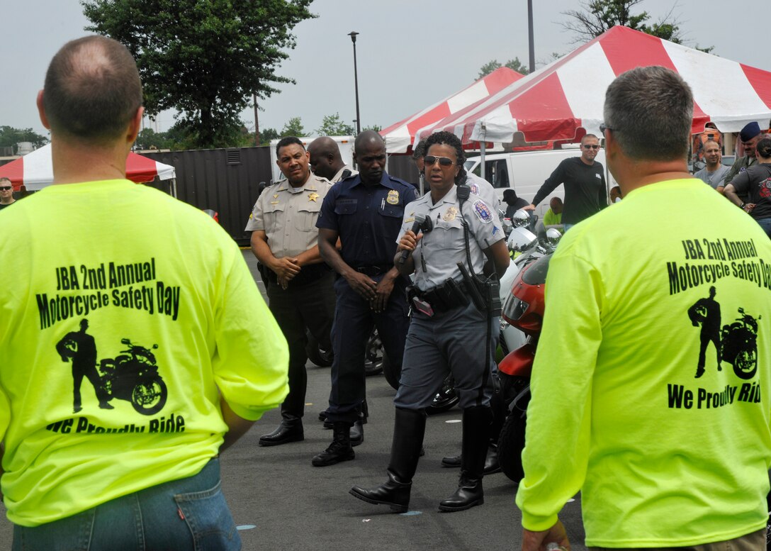 Cpl. Gretta Killerlane, Prince George’s County Police Department motorcycle officer, gives feedback to a question during an open discussion at Joint Base Andrews’ Motorcycle Safety Day on July 13.  (U.S. Air Force photo/Senior Airman Lindsey A. Porter)