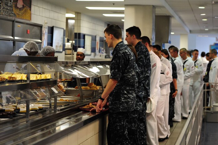 Sailors take a break from their studies as they prepare to eat lunch at the Galley at Joint Base Charleston - Weapons Station, S.C., July 13, 2012. The Galley serves approximately 3,000 meals a day to "A" School students as well as active duty and Reserve members working at JB Charleston - Weapons Station. (U.S. Air Force photo/ Airman 1st Class Chacarra Walker)