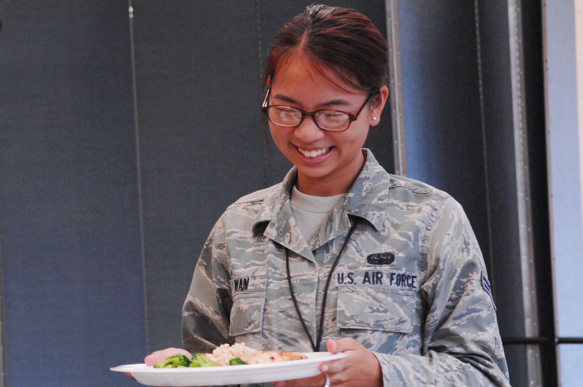 U.S. Air Force Airman 1st Class Josephine Wan, AFCENT/A-4 knowledge operations manager, attends a microwave cooking class for Airmen at the community center, Shaw Air Force Base, S.C., July 12, 2012.  The class provided Airmen with easy to cook recipes they can make in the dorms.(U.S. Air Force photo by Airman Nicole Sikorski/Released) 